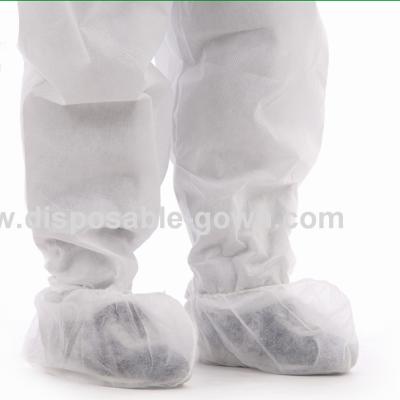 China Cubierta disponible no tejida médica adulta del zapato con el caucho elástico en la abertura en venta