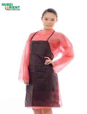 China Lightweight Oil Proof Disposable Nonwoven Apron Without Sleeves for sale
