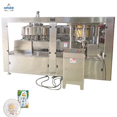 China Canned coconute milk juice filling seaming machine with cold glue labeling machine line à venda