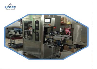 China Máquina de etiquetado automática de la manga del encogimiento para el túnel del encogimiento del vapor de la clase de la taza en venta