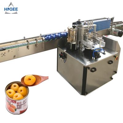 China Automatic canned fruit cocktail labeling machine with glass bottle cold glue labeling machine bench top wet glue labeler for sale