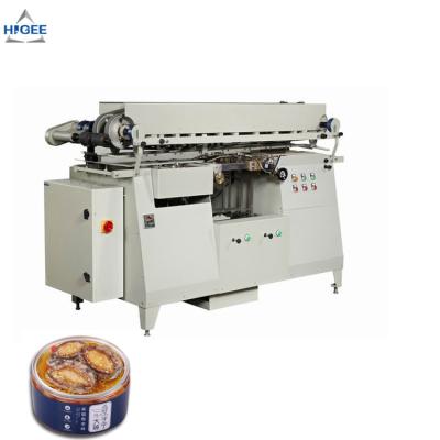 China Automatic fish can filling labeling machine canned mud fish labeling machine cold glue labeling machine for sale