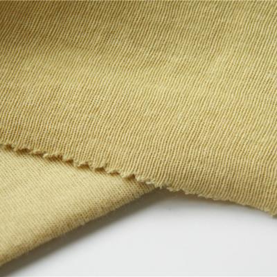 China 300gsm 100% Para Aramid Fabric Raw Yellow For Anti Cut Gloves for sale