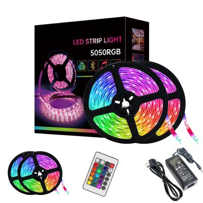 Cina 10 meters 12v leds lights 5050 RGB led strip waterproof with Remote control colorful intelligent light in vendita