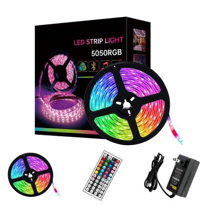 China IP20 44 key IR remote controlled 5050 5M 150LED 12V RGB LED strip with power adapter for sale