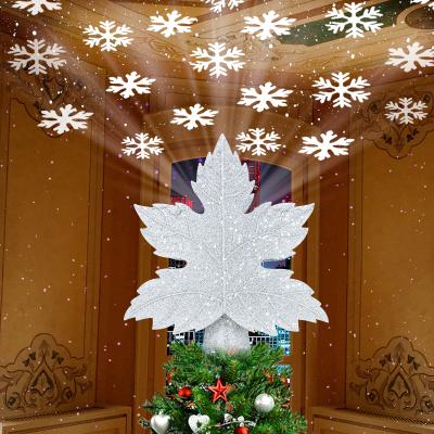 Cina 3D Glitter Maple leaf Snowflake LED Christmas Tree Topper Decorate Projector For Christmas Tree Ornament in vendita