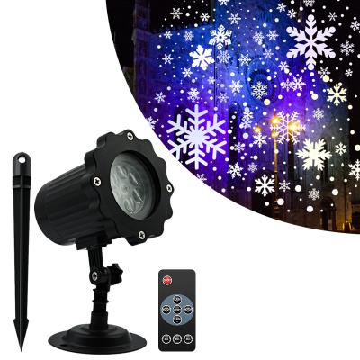 China Christmas Projector Lights Remote Control Holiday Decoration Ip65 Outdoor Waterproof Projection Snowflakes Lamp Snow Light for sale