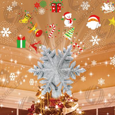 China Christmas Tree Topper Decorations Projector Light 3D Rotating Hollow Glitter Snowflake Xmas Tree Decor with 6 Projection Star Te koop