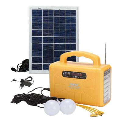China 12v 7000mAh Small Solar Lighting System With 3 Led Bulb Kit And Mp3 FM Radio for sale