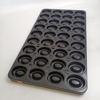 Chine 36 plateaux de cuisson de gâteau ovale en acier en aluminium de beignet de cavité à vendre