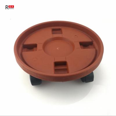 China 30cm Plastic Flower Pot Base With Wheels 4 Rollers Movable Lightweight for sale