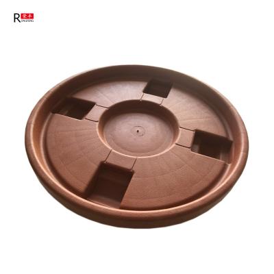 China Movable Universal Plant Pot Saucers On Wheels , Plastic Plant Trays Landing Type for sale