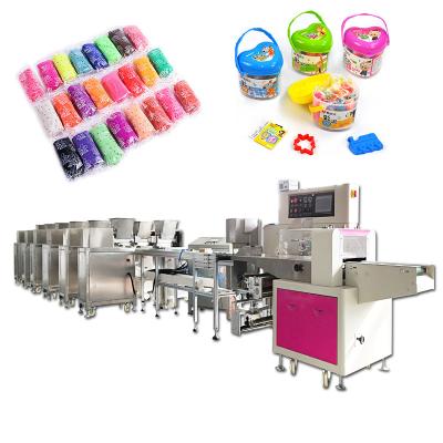 China OPP Film Industrial Bagging Machine Plasticine Clay Packaging Machine 220v for sale