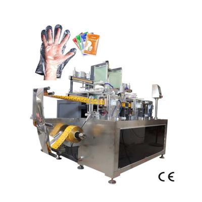 China 70PCS / Min Four Side Seal Packing Machine Disposable PE Glove 2 In 1 Packaging Machine for sale