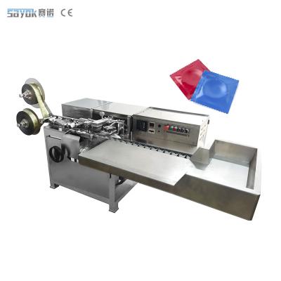 China Small Aluminum Foil Precision Pouch Condom Packaging Machine With Inspection System for sale