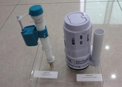 中国 プラスチック注入の形成の部品/単一および二重ボタンの洗面所タンク付属品 販売のため