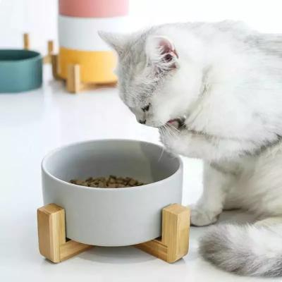China Ceramic Pet Food Bowl Dog Feeder With Bamboo Stand For Pet Dog Cat for sale
