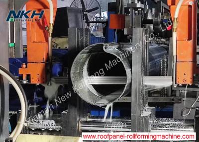 China Máquina de moldeado de tubos de puerta de persiana rodante, máquina de moldeado de tubos de puerta de persiana de acero con soldadura por láser en línea en venta