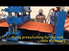 Tile roof roll forming machine with flying pressing and cutting