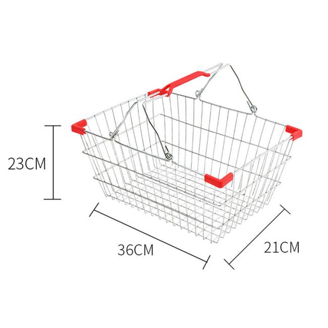 Stainless steel handheld shopping basket in retail environment