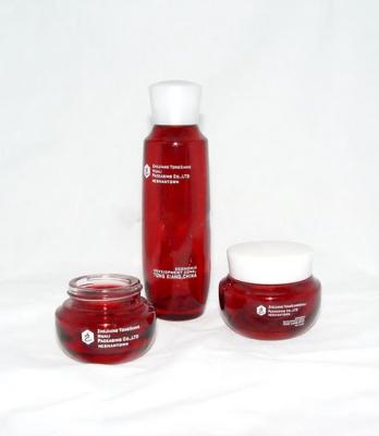 China Custom Emulsion red Cosmetic Glass Bottle Bottles and Jars 130ML 100ML 50ML 30ML for sale