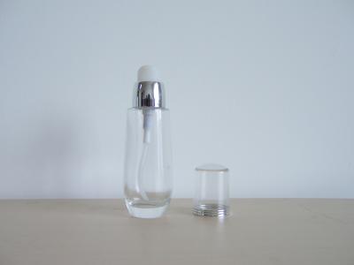 China 25ml que pulveriza garrafas de vidro vazias para cosméticos da fundação com a bomba & o tampão do PESO à venda