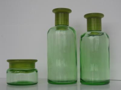 China Green Colored Essential Oil Glass Bottles 200ML 150ML 50G with Orifice Reducer & Cap for sale