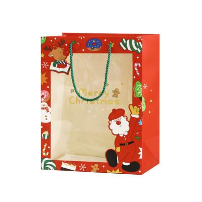 Cina Carta stampata su ordinazione Carry Bags Packaging With Window per il regalo di Buon Natale in vendita