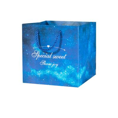 China Buy Custom Printed Square Wide Gusset Paper Paper Carry Bags Manufacturers for sale