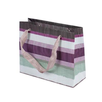 China Custom Printed Creative Patterned Paper Product Bags Striped Paper Bags for sale