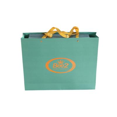 China Custom Luxury Printed Paper Gift Bags Packaging With Holographic Logo Factory for sale