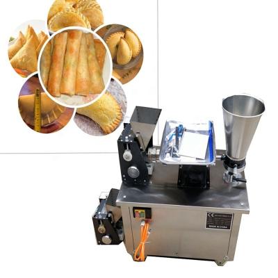 China Small Automatic Dumpling Making Machine Meat Pie Making Equipment 3600PCS/H for sale
