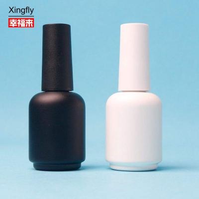 China Custom 11ml Round White Black UV Gel Empty Nail Polish Glass Bottle With Brush Caps for sale