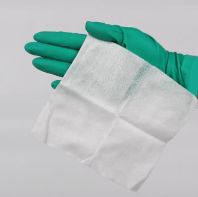 中国 30GSM外科AbsorbenのNonwoven圧縮機械の傷のための生殖不能のガーゼの綿棒のスポンジ 販売のため