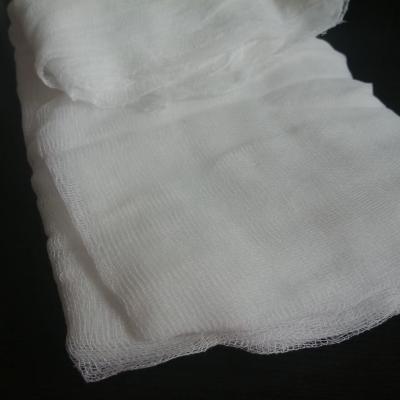 China Rollo de gasa grande de algodón orgánico 100% médico, gasa absorbente blanqueada en venta