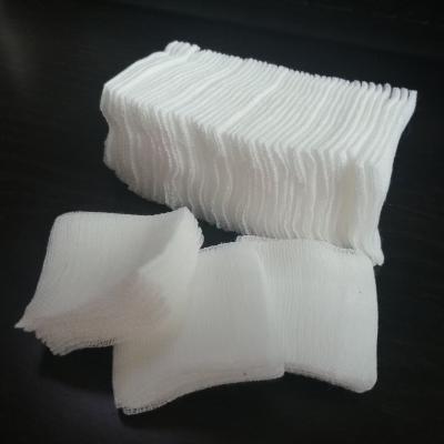 中国 4層2X2インチの白い吸収性のガーゼの綿棒100PCSは傷つけられた心配を詰める 販売のため