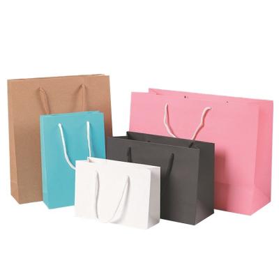 China Best sale custom christmas paper shopping bag color famous brand paper tote bags with logo pvc pink for sale