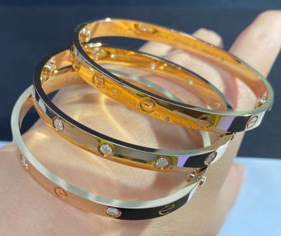 China Unisex 18k Gold Jewelry Anniversary Engagement Hk Setting Bangle for sale