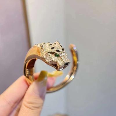 China Pulsera de tigre Francia Caja de regalo de joyería de oro de 18 quilates Diamantes y fábrica de joyería con grabado personalizado en venta