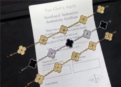 Chine Or blanc Van Cleef de 18 carats et bracelet d'Alhambra de cru d'Arpels avec le diamant et l'onyx à vendre