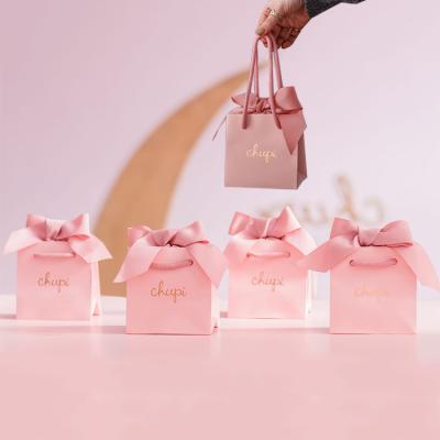 China Custom Printed Wedding Jewellery Gift Packaging Shopping Paper Bags With Ribbon Handles for sale