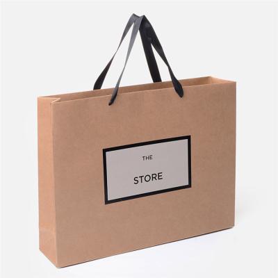 China China Wholesale Custom Luxury Designed Paper Kraft Bags With Logo for sale