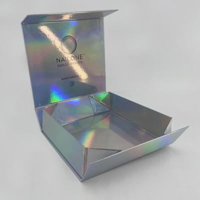 China Custom Printed Deluxe Holographic Rigid Foldable Magnetic Closure Gift Cosmetics Packaging Paper Box for sale