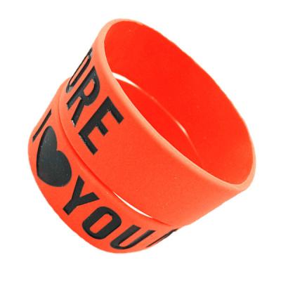 China O punho vermelho rápido de Taylor, braceletes do silicone dos esportes, preencheu a cor à venda