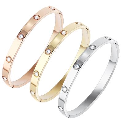 China 2020 Fashionable Jewelry Ladies Crystal Stone Cuff Stainless Steel Engraved Screw Bangle Bracelet for sale