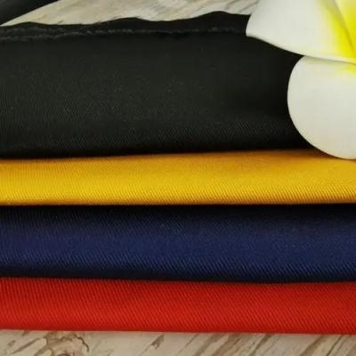 China Tejido de espandéx de algodón de patrón de trenzado de baja contracción para ropa en venta