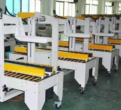 China Semi Automatic Box Strapping Machine , Tape Tying Machine 430kg for sale