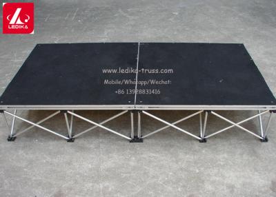 中国 小さいでき事のための軽量のアルミ合金のモジュラー段階のテーブルの黒の赤い合板 販売のため