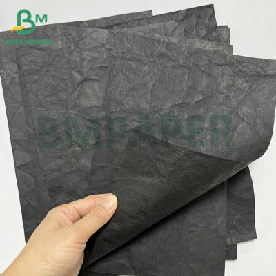 China 0.55mm Black Biodegradable Durable Washable Jeans Label paper for sale