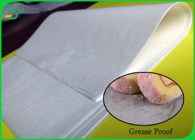 China rolo branco do papel do ofício de 29g 31g 40g resistente ao calor para bandejas de cozimento de papel descartáveis à venda